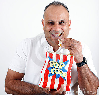 office-worker-eating-popcorn-15568428.jpg